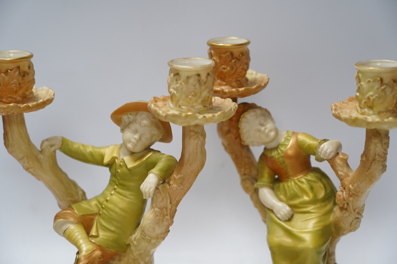 A pair of Hadley Worcester candelabra, model numbers 1124 and 1125, 22cm. Condition - good